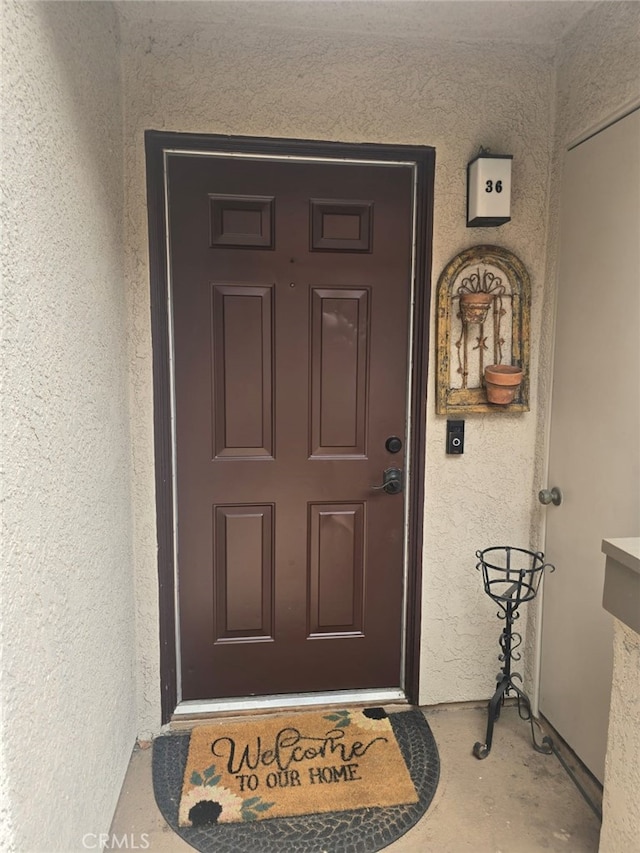 28151 Montecito Unit 36, Laguna Niguel, CA 92677 - view of exterior entry featuring stucco siding
