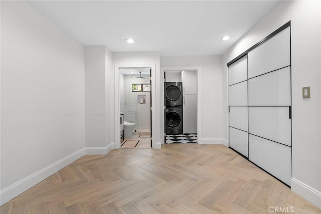 2223 Flintridge Dr, Glendale, CA 91206 - laundry room featuring stacked washer / dryer, baseboards, and recessed lighting