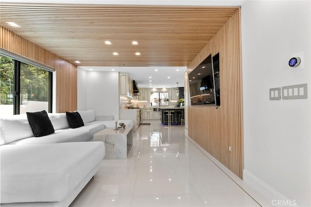 2223 Flintridge Dr, Glendale, CA 91206 - living room featuring wood walls, wood ceiling, baseboards, and light tile patterned floors