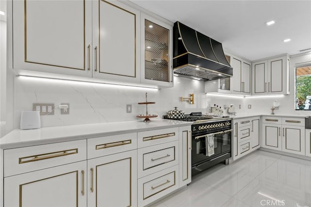 2223 Flintridge Dr, Glendale, CA 91206 - kitchen with custom exhaust hood, range with two ovens, light countertops, and recessed lighting