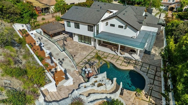 2223 Flintridge Dr, Glendale, CA 91206 - aerial view of property and surrounding area featuring a pool area