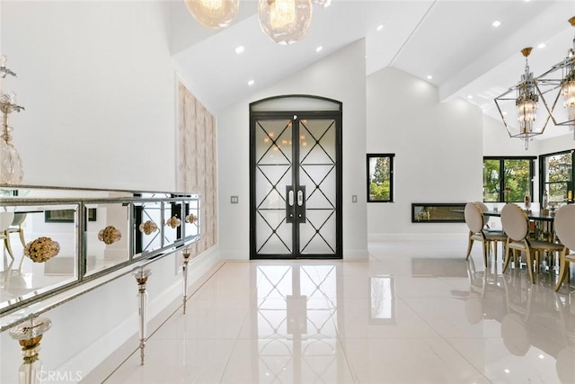 2223 Flintridge Dr, Glendale, CA 91206 - entryway with high vaulted ceiling, tile patterned floors, a chandelier, baseboards, and recessed lighting