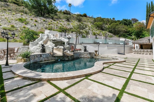 2223 Flintridge Dr, Glendale, CA 91206 - view of swimming pool with a patio area
