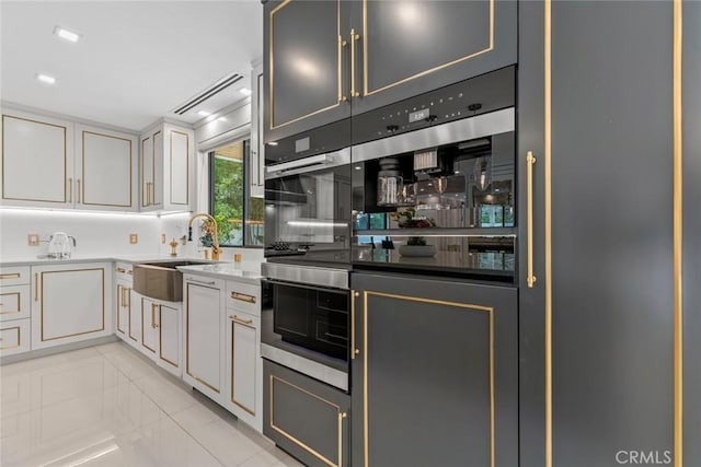 2223 Flintridge Dr, Glendale, CA 91206 - kitchen featuring a sink, white cabinetry, and double oven