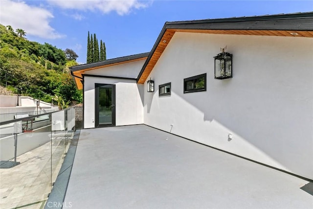 2223 Flintridge Dr, Glendale, CA 91206 - rear view of property featuring stucco siding and a patio