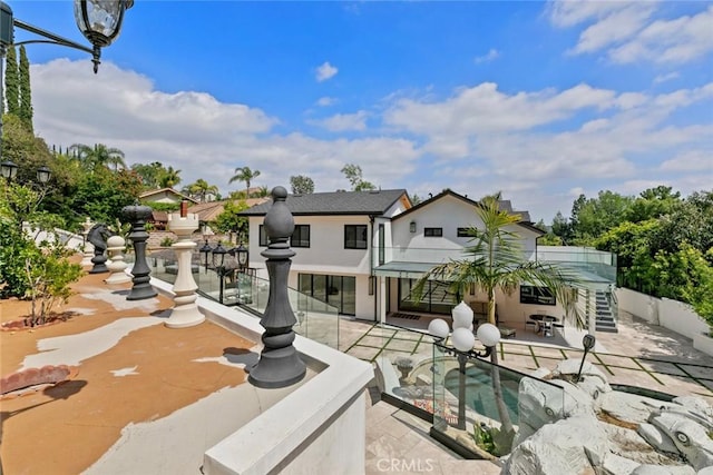 2223 Flintridge Dr, Glendale, CA 91206 - rear view of property featuring a patio and stucco siding