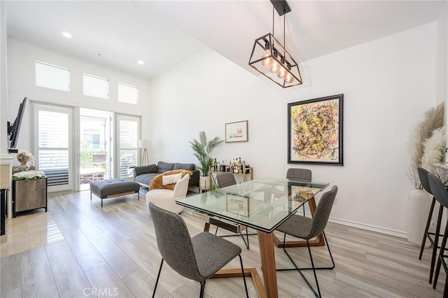 2233 Martin Unit 411, Irvine, CA 92612 - dining space featuring light wood finished floors and recessed lighting