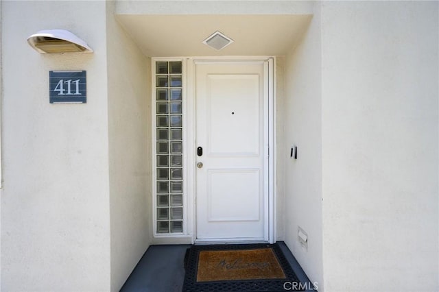 2233 Martin Unit 411, Irvine, CA 92612 - view of exterior entry with stucco siding