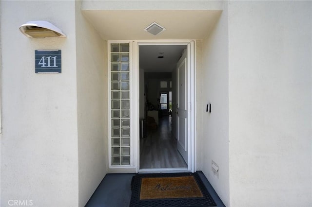 2233 Martin Unit 411, Irvine, CA 92612 - doorway to property with stucco siding