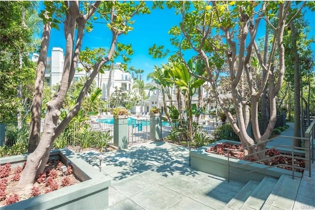 2233 Martin Unit 411, Irvine, CA 92612 - view of patio / terrace with a community pool