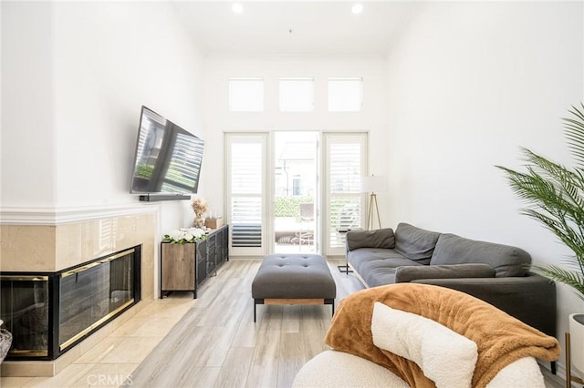 2233 Martin Unit 411, Irvine, CA 92612 - living room with a premium fireplace and recessed lighting
