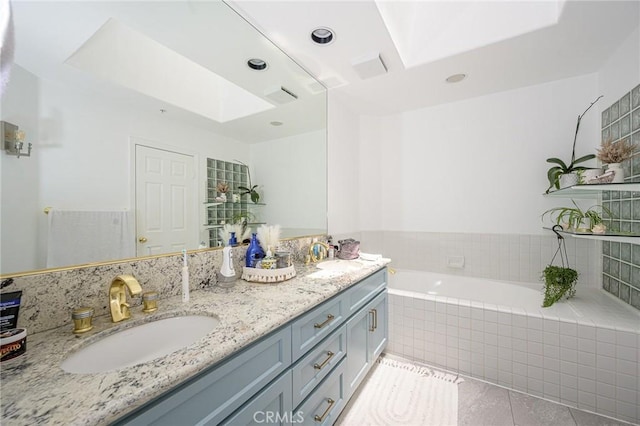 2233 Martin Unit 411, Irvine, CA 92612 - bathroom with a garden tub, double vanity, tile patterned floors, and recessed lighting