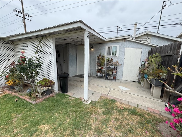 7232 W Cerritos Ave, Stanton, CA 90680 - back of house with stucco siding and a patio area