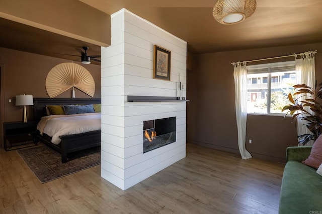 1958 Edgemont St, San Diego, CA 92102 - bedroom with wood finished floors and a fireplace