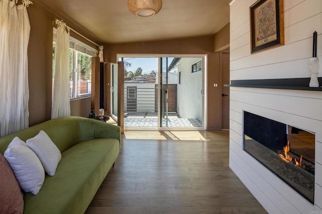 1958 Edgemont St, San Diego, CA 92102 - living room with a glass covered fireplace and wood finished floors