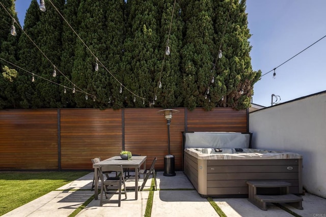 1958 Edgemont St, San Diego, CA 92102 - view of patio / terrace with a hot tub and outdoor dining area