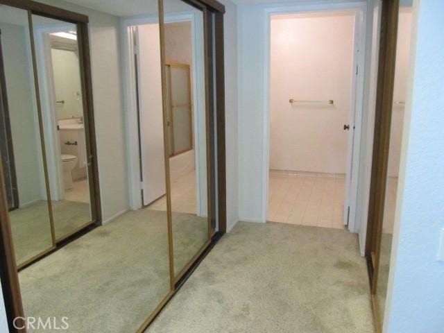 13601 Del Monte Dr Unit M17-46A, Seal Beach, CA 90740 - hallway with carpet