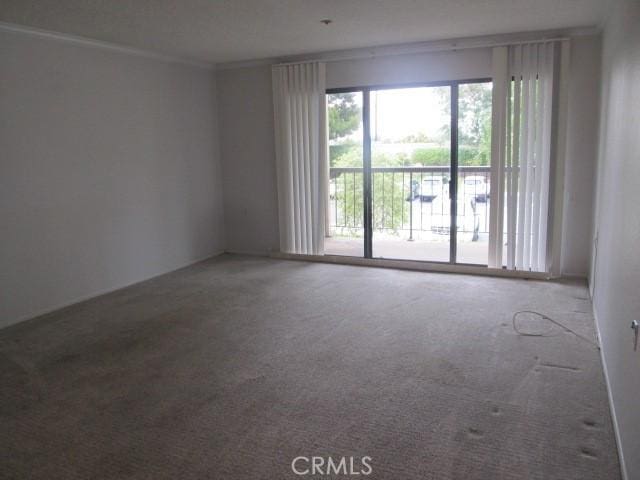 13601 Del Monte Dr Unit M17-46A, Seal Beach, CA 90740 - unfurnished room with healthy amount of natural light and carpet