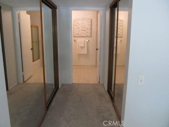 13601 Del Monte Dr Unit M17-46A, Seal Beach, CA 90740 - hall with light carpet