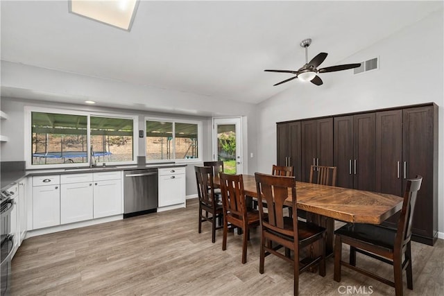 27747 Wakefield Rd, Castaic, CA 91384 - dining space with vaulted ceiling, light wood-type flooring, and a ceiling fan