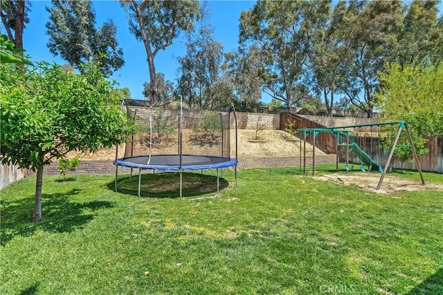 27747 Wakefield Rd, Castaic, CA 91384 - view of yard with a trampoline and a playground