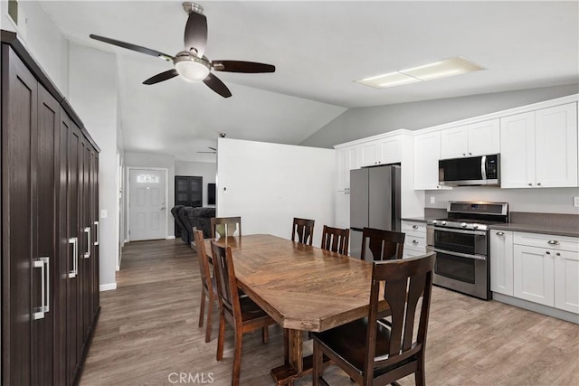 27747 Wakefield Rd, Castaic, CA 91384 - dining space featuring vaulted ceiling, ceiling fan, and light wood-style floors