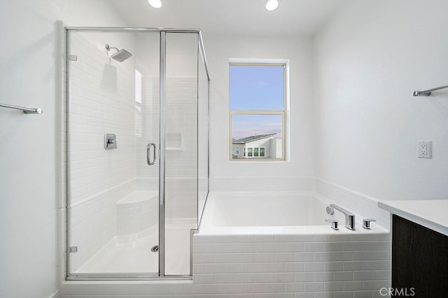 35806 Mccarthy St, Palm Desert, CA 92211 - full bathroom with a garden tub, a shower stall, vanity, and recessed lighting