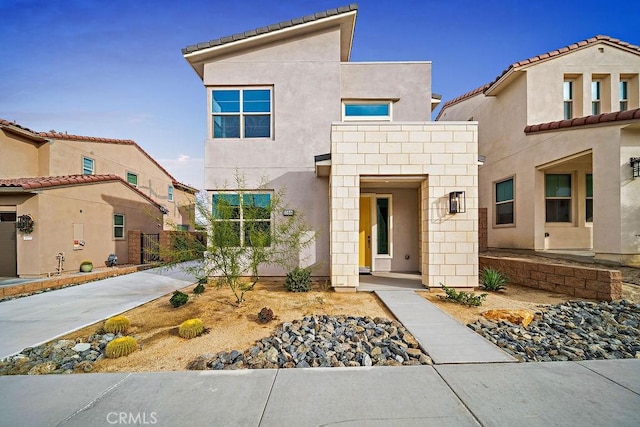 35806 Mccarthy St, Palm Desert, CA 92211 - view of front of house featuring stucco siding and a tile roof