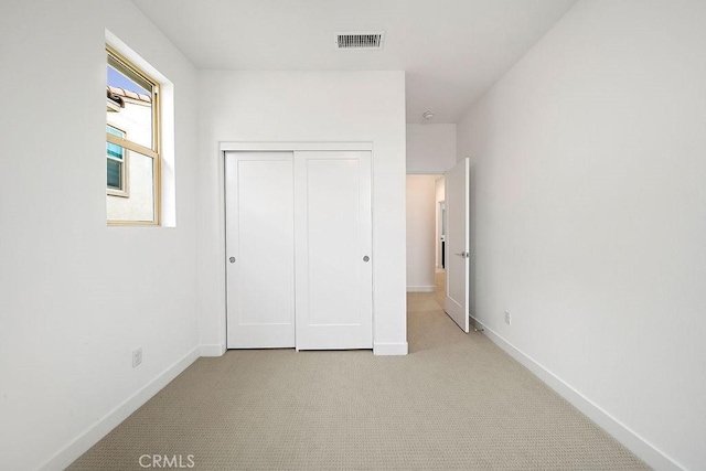 35806 Mccarthy St, Palm Desert, CA 92211 - unfurnished bedroom with baseboards, carpet flooring, and a closet