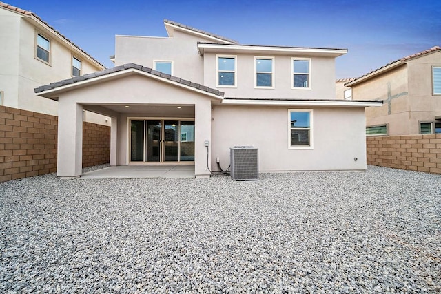 35806 Mccarthy St, Palm Desert, CA 92211 - back of house with central AC unit, a patio area, stucco siding, and a tiled roof