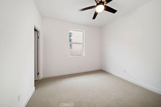 35806 Mccarthy St, Palm Desert, CA 92211 - spare room featuring ceiling fan, light carpet, and baseboards
