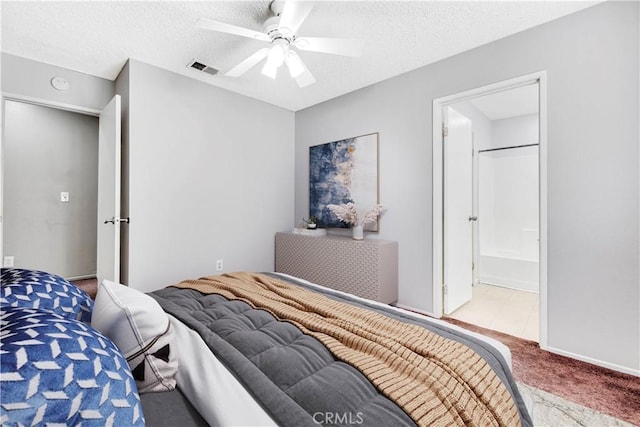 37940 42nd St E Unit 125, Palmdale, CA 93552 - carpeted bedroom with a textured ceiling, a ceiling fan, and ensuite bathroom