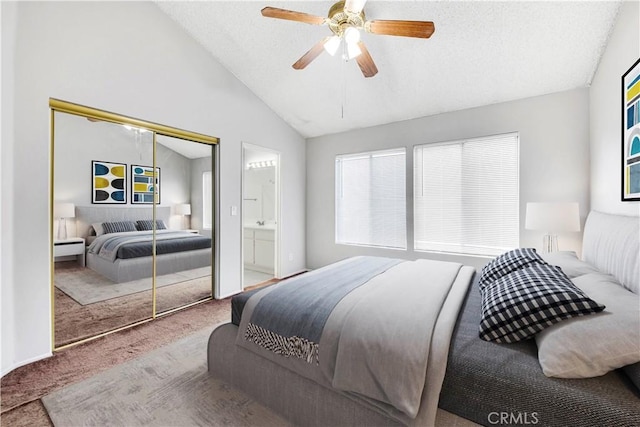 37940 42nd St E Unit 125, Palmdale, CA 93552 - bedroom featuring carpet flooring, vaulted ceiling, a closet, ceiling fan, and ensuite bath