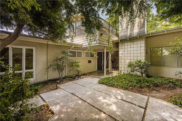 390 Peralta Ave, Long Beach, CA 90803 - rear view of property with a balcony, a patio, and stucco siding