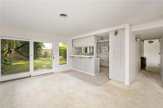 390 Peralta Ave, Long Beach, CA 90803 - unfurnished living room with baseboards