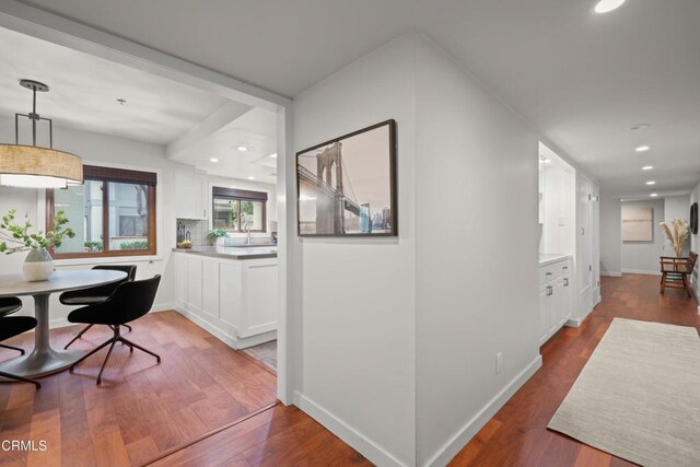 1000 E California Blvd Unit 108, Pasadena, CA 91106 - hall with wood finished floors, recessed lighting, and baseboards