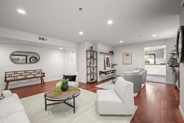 1000 E California Blvd Unit 108, Pasadena, CA 91106 - living room featuring recessed lighting, dark wood finished floors, and baseboards