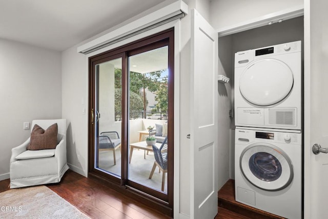 1000 E California Blvd Unit 108, Pasadena, CA 91106 - washroom featuring stacked washer and clothes dryer, dark wood-style flooring, and baseboards