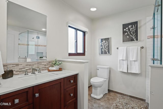 1000 E California Blvd Unit 108, Pasadena, CA 91106 - bathroom with vanity, a shower stall, toilet, baseboards, and tasteful backsplash