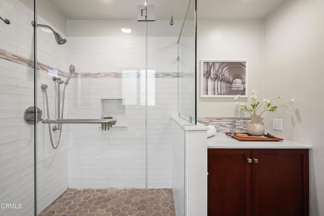 1000 E California Blvd Unit 108, Pasadena, CA 91106 - bathroom featuring a stall shower, vanity, and tasteful backsplash