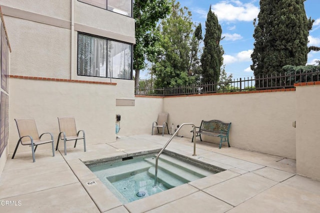 1000 E California Blvd Unit 108, Pasadena, CA 91106 - view of swimming pool featuring a patio area and an in-ground hot tub
