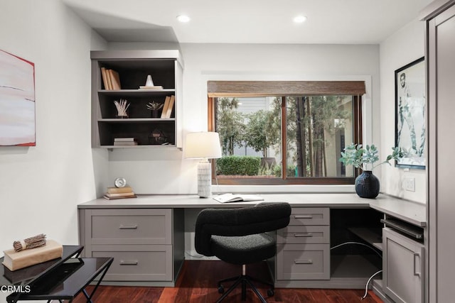 1000 E California Blvd Unit 108, Pasadena, CA 91106 - home office with built in study area, dark wood finished floors, and recessed lighting
