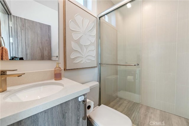 2713 Carnegie Ln Unit B, Redondo Beach, CA 90278 - full bathroom with toilet, a stall shower, and vanity