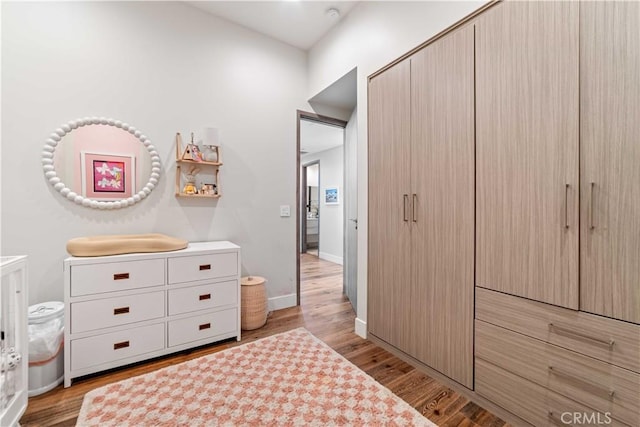 2713 Carnegie Ln Unit B, Redondo Beach, CA 90278 - bedroom featuring light wood-style floors and baseboards