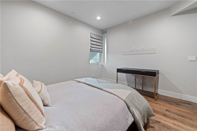 2713 Carnegie Ln Unit B, Redondo Beach, CA 90278 - bedroom with wood finished floors, baseboards, and recessed lighting