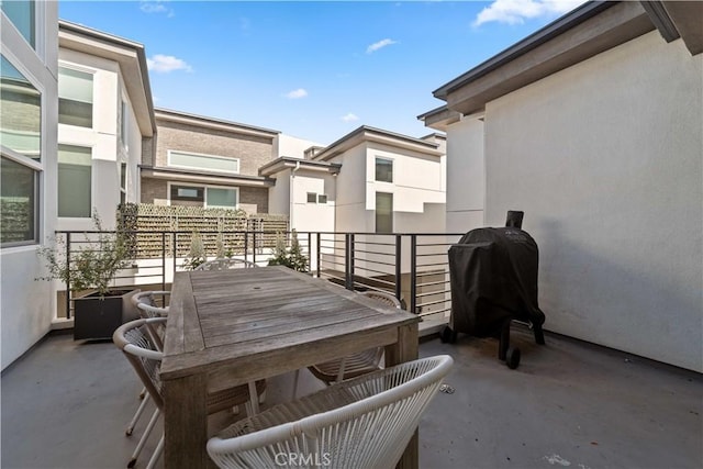 2713 Carnegie Ln Unit B, Redondo Beach, CA 90278 - view of patio featuring a balcony, a grill, and outdoor dining area