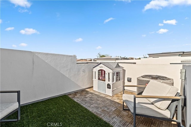 2713 Carnegie Ln Unit B, Redondo Beach, CA 90278 - view of patio / terrace featuring central AC unit