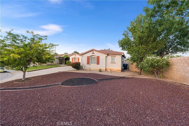 39202 Nicole Dr, Palmdale, CA 93551 - mediterranean / spanish home featuring stucco siding, a tile roof, and driveway
