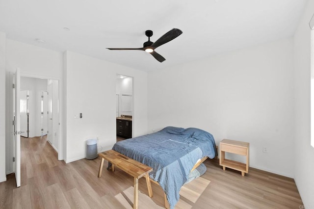 5485 Seacliff Pl Unit 106, San Diego, CA 92154 - bedroom with light wood-type flooring, baseboards, and a ceiling fan