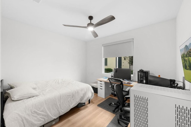 5485 Seacliff Pl Unit 106, San Diego, CA 92154 - bedroom featuring wood finished floors, an office area, and ceiling fan